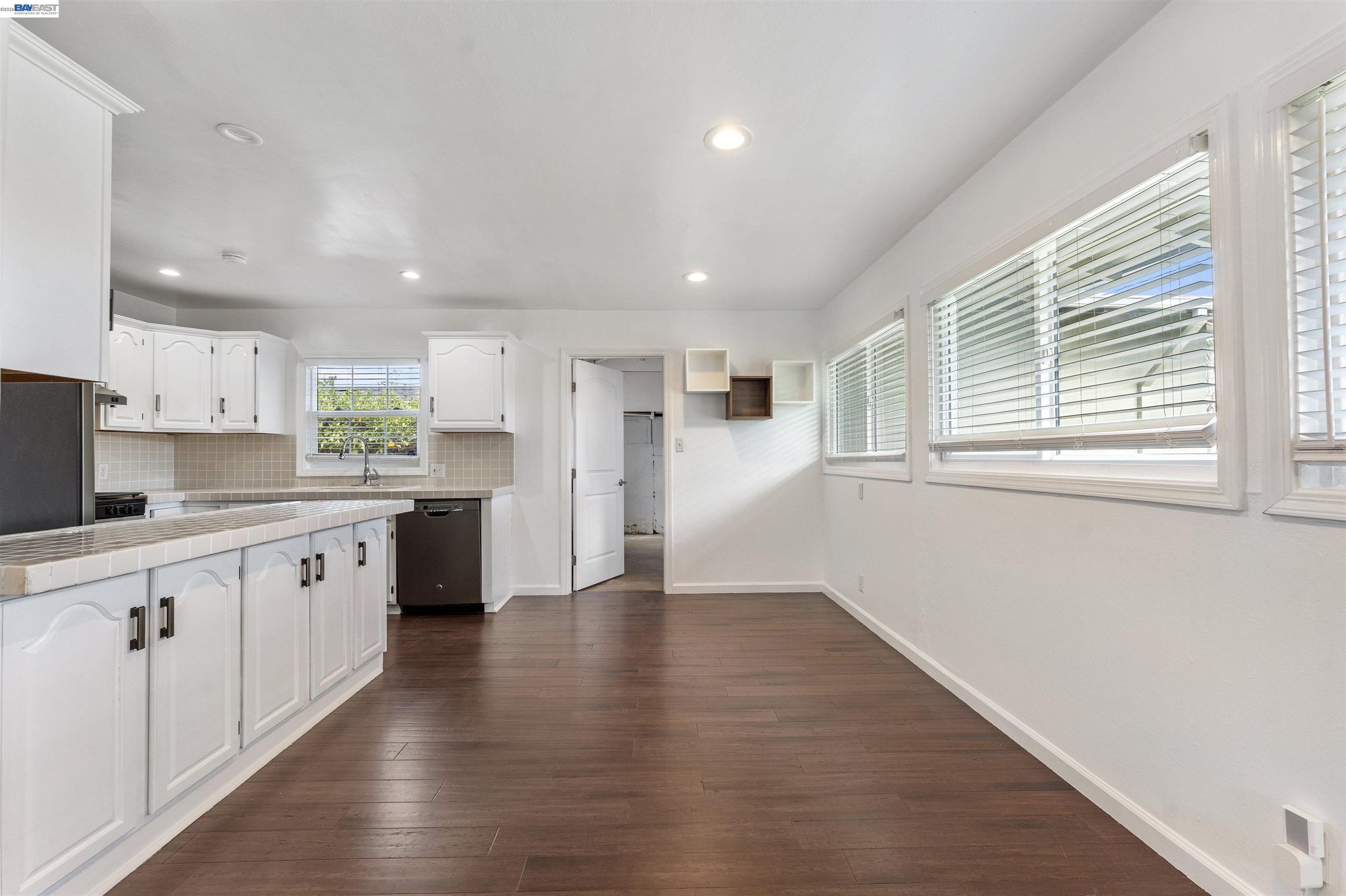 Wide view of the kitchen and dining area