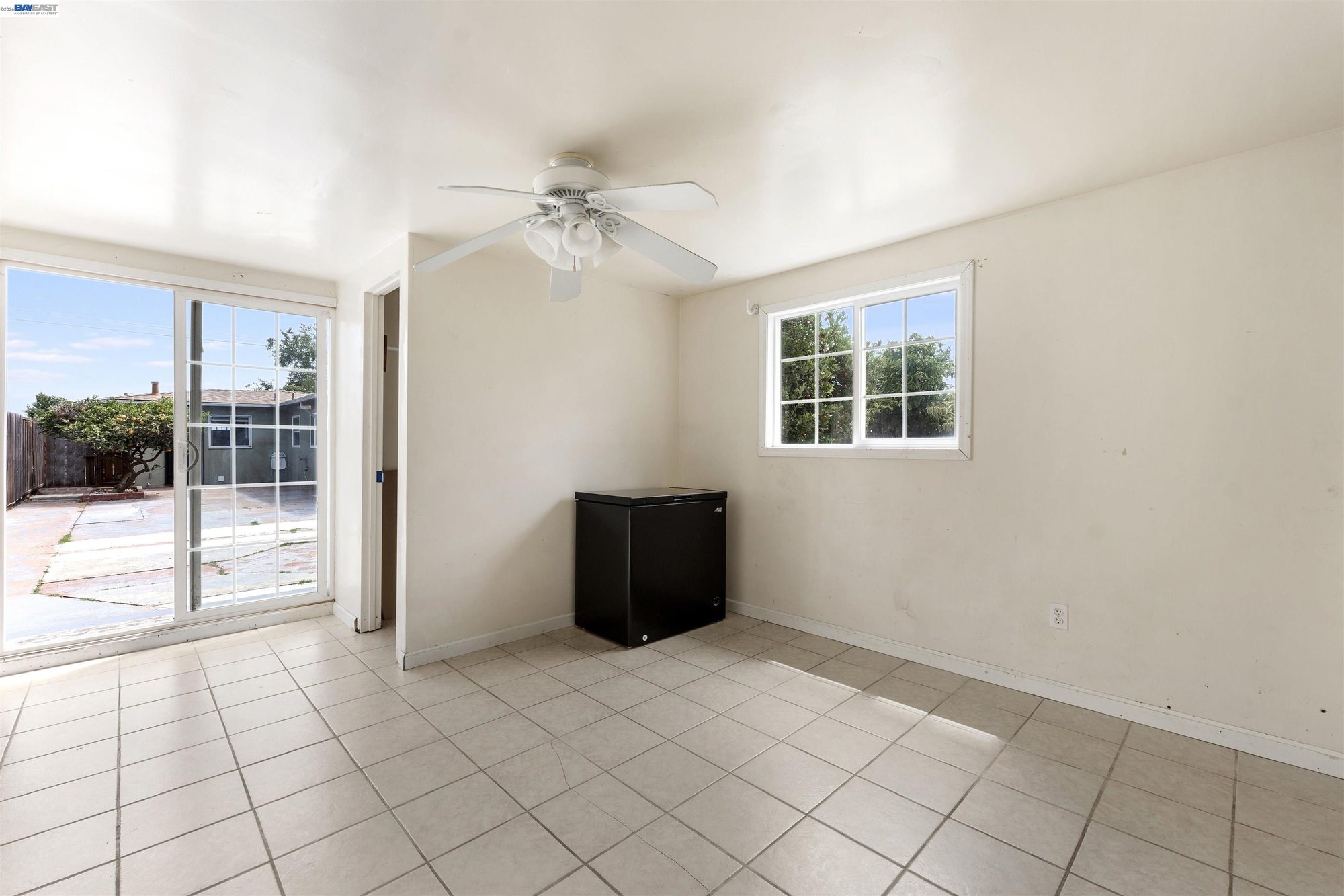 Interior of the detached bonus room with sliding door