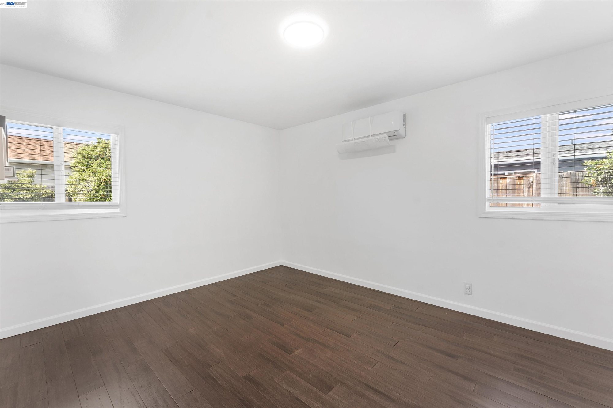Bedroom with natural light and closet