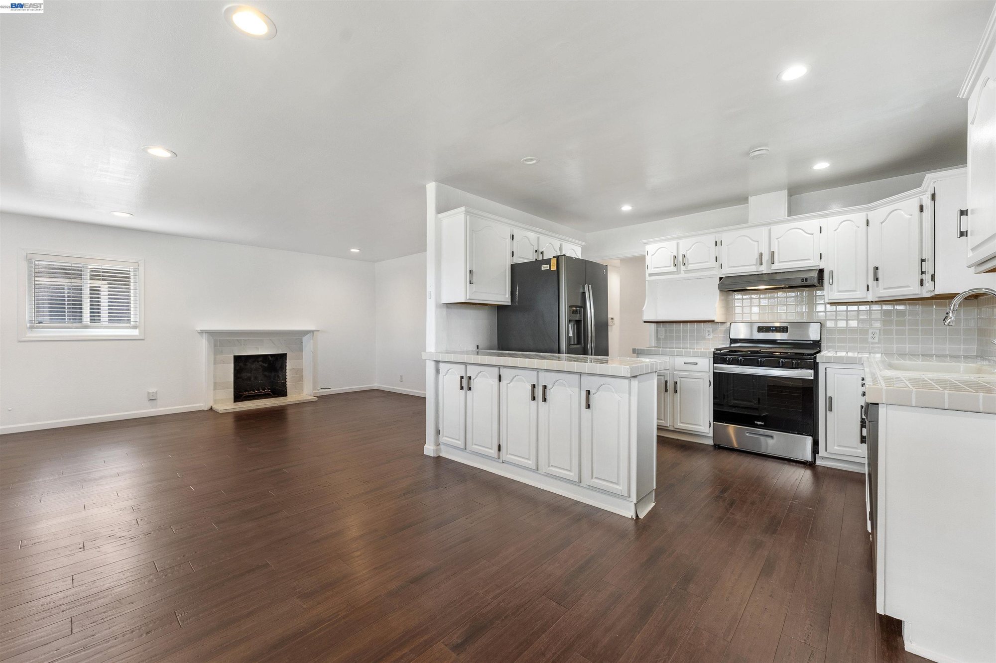 Kitchen open to the living room fireplace